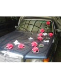 Décoration de voiture pour mariage avec papillon et roses fuchsia