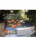 Decoration de voiture mariage orange et vert avec papillons