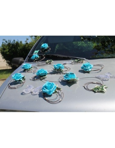 Décoration voiture mariées turquoise papillons