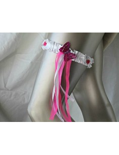 Jarretière couleur blanc fushia avec avec papillon, roses et rubans
