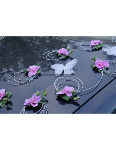 Décoration pour voiture mariage parme avec orchidée et papillons