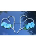 Cœurs de mariage bleu turquoise, blanc orchidées avec des perles