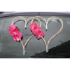 Décoration voiture mariage en cœur de rotin avec orchidées fuchsia