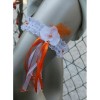 Jarretière mariée orchidée blanc et orange rubans
