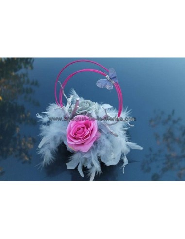 Décoration mariage table plumes papillon fuchsia et gris argenté